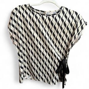 Black and white blouse with wraparound tie and unique pattern